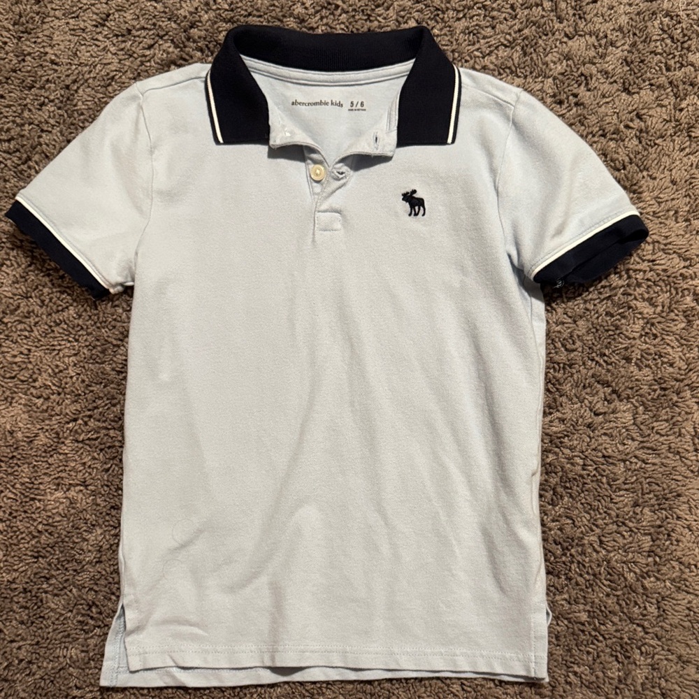 Light blue Abercrombie Kids Polo Shirt with Navy Blue Collar